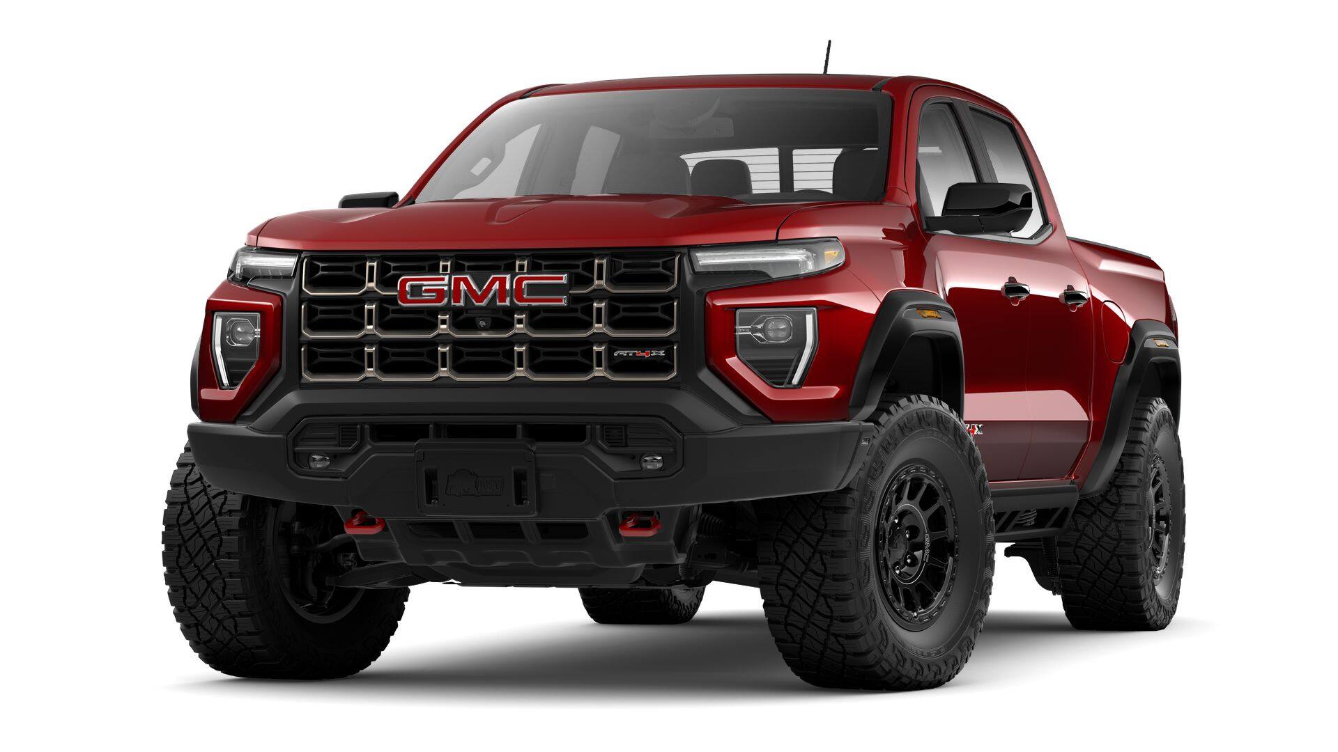 2026 GMC Canyon AT4X in Volcanic Red Tintcoat — front three-quarter view